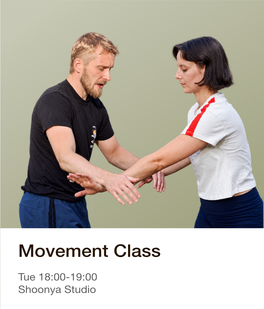 Movement Class, Tuesday 18:00–19:00 at Shoonya Studio. Sam guiding a partner through a slow arm exercise.