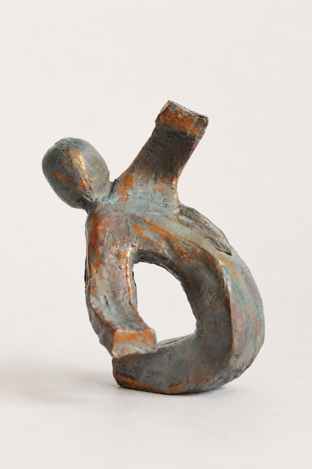 Arching dancer figurine, abstract style, expressive and powerful